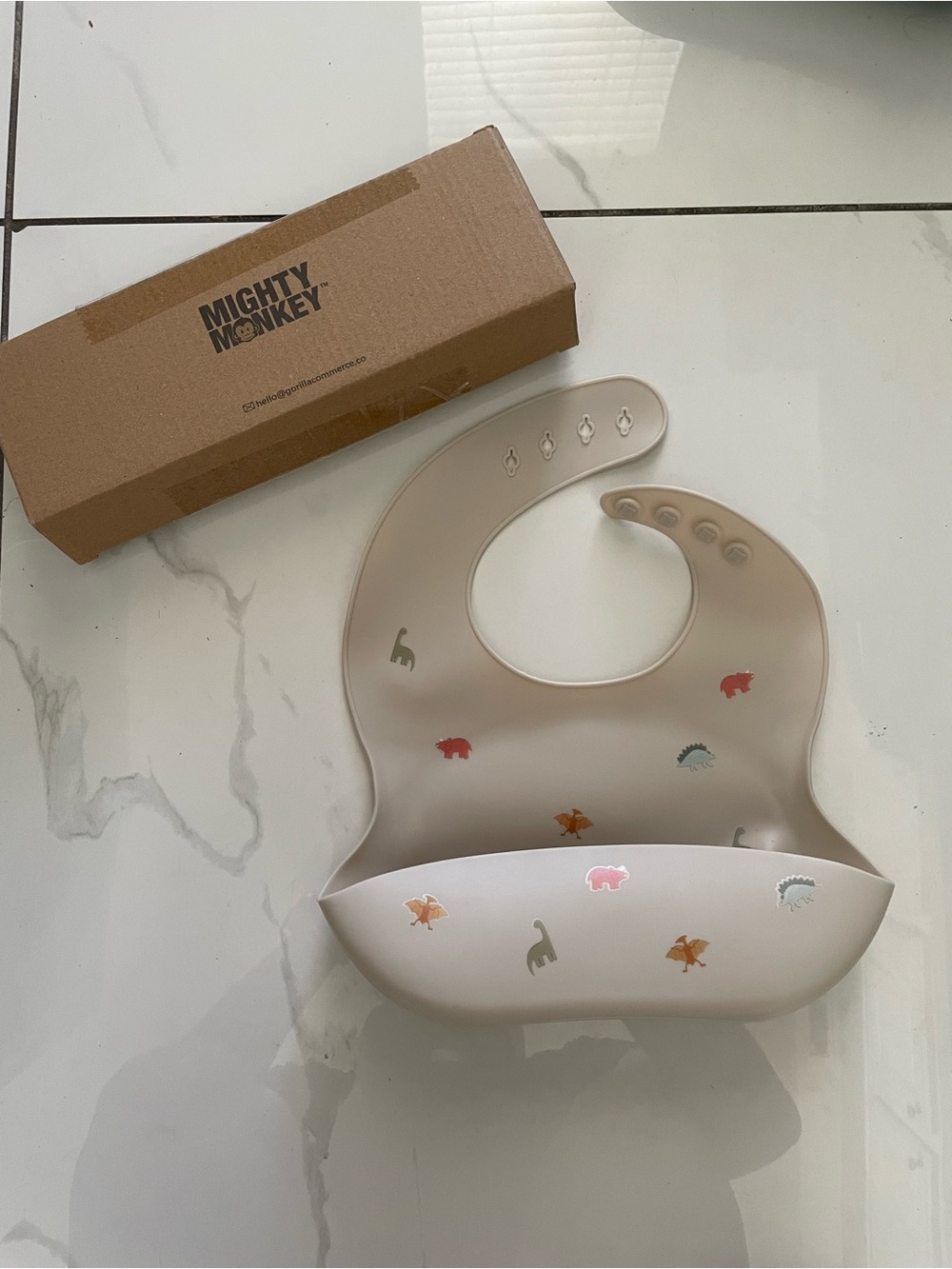 Beige Silicone Baby Bib with Dino Motif